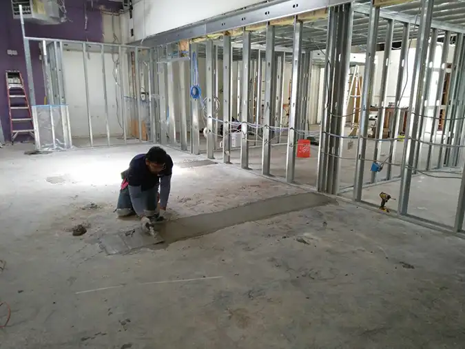 Carpenter working on floor